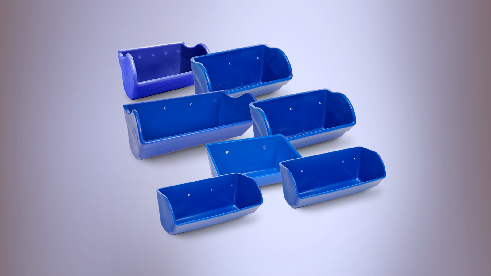 Seven blue polyethylene elevator buckets, various sizes, overlapping against a light blue gradient backdrop.