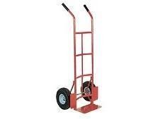 Red hand truck with black wheels, for moving items.