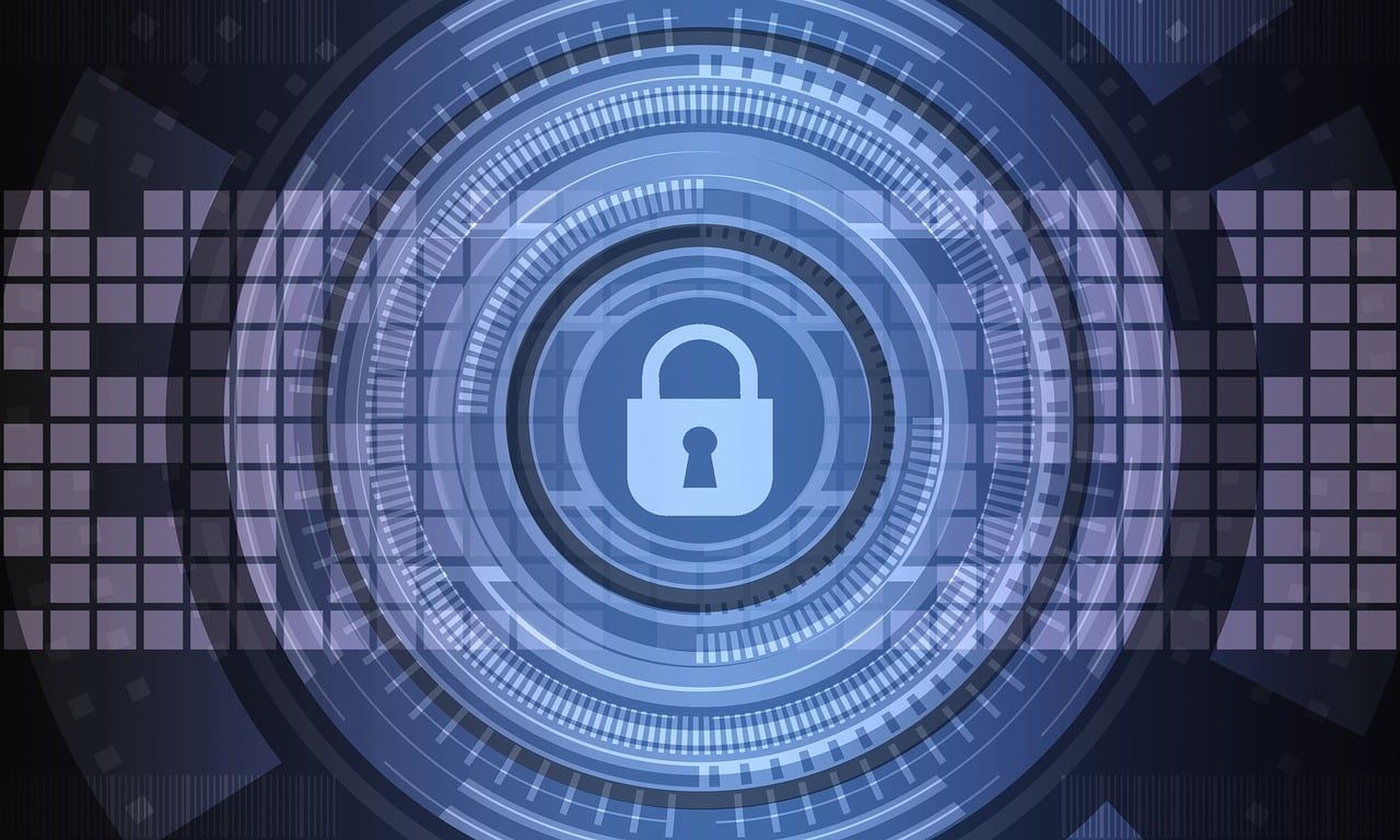 Blue digital security graphic with a padlock icon in the center, surrounded by concentric circles and a pixelated border.