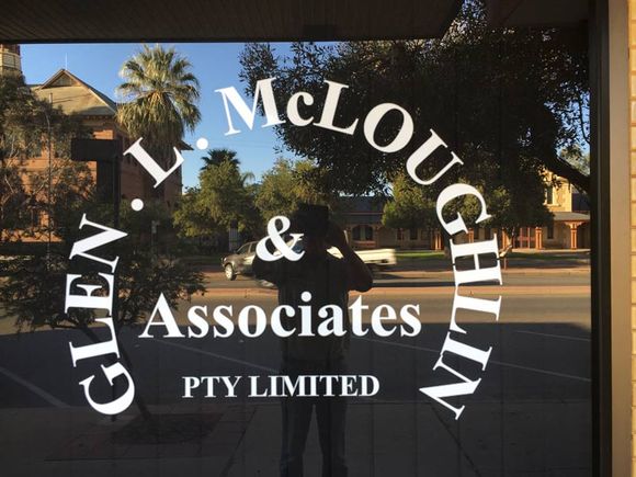 sign on glass