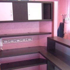 Realizzazione mobile reception per studio dentistico in rovere tinta venghè