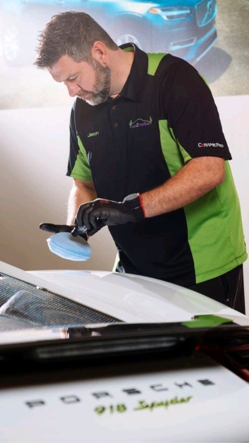 A CarZmedics paint protection specialist ceramic coating a Porsche in Cave Creek Arizona.