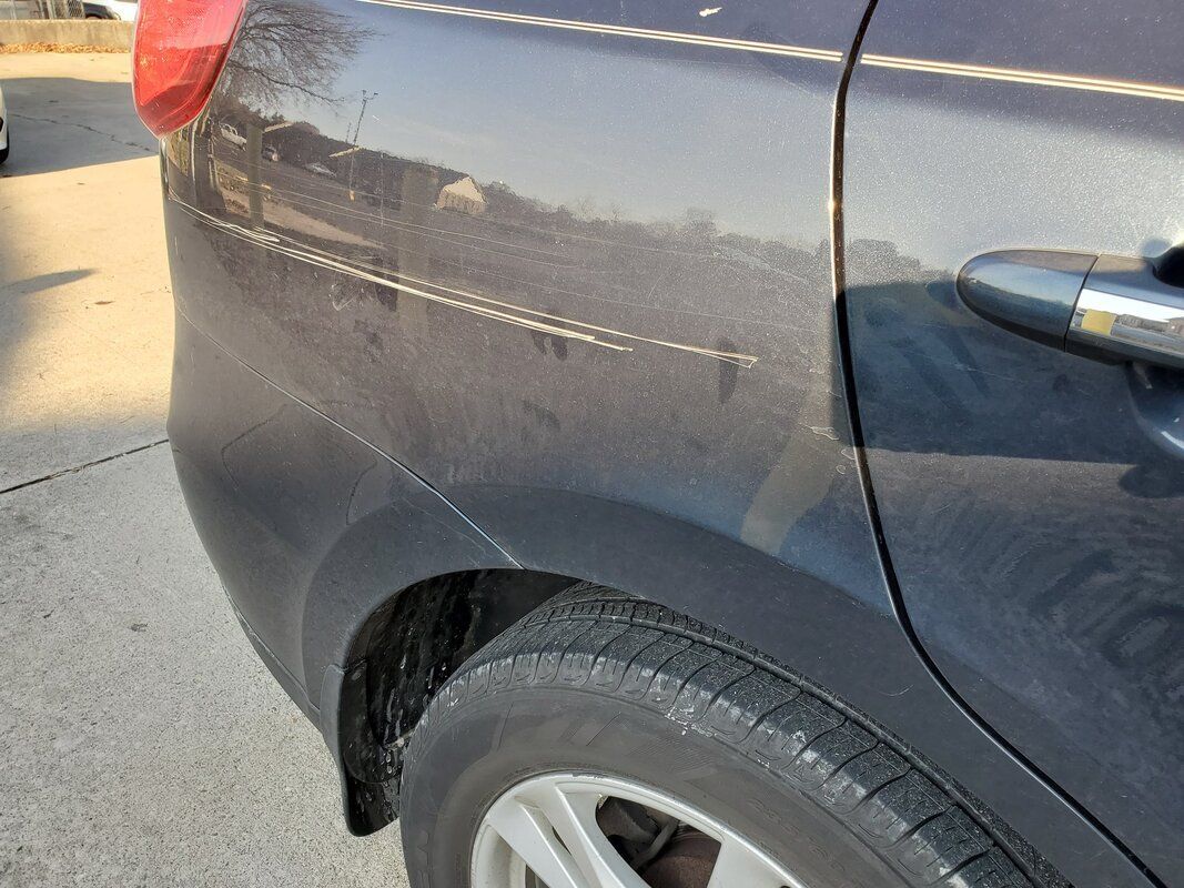 Rear Scratch Damage On Car
