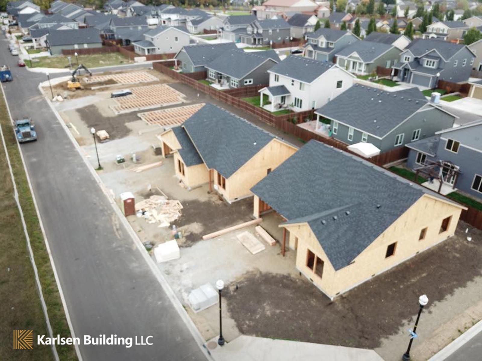 An aerial view of a residential neighborhood being built by karsten building llc