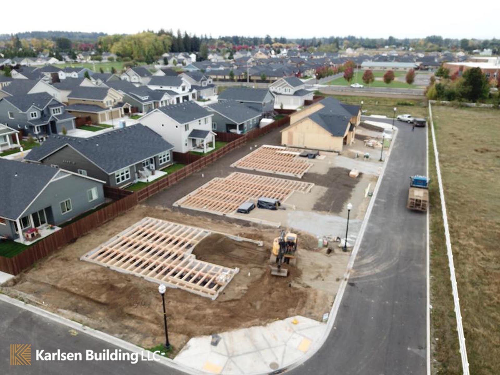 An aerial view of a residential neighborhood under construction