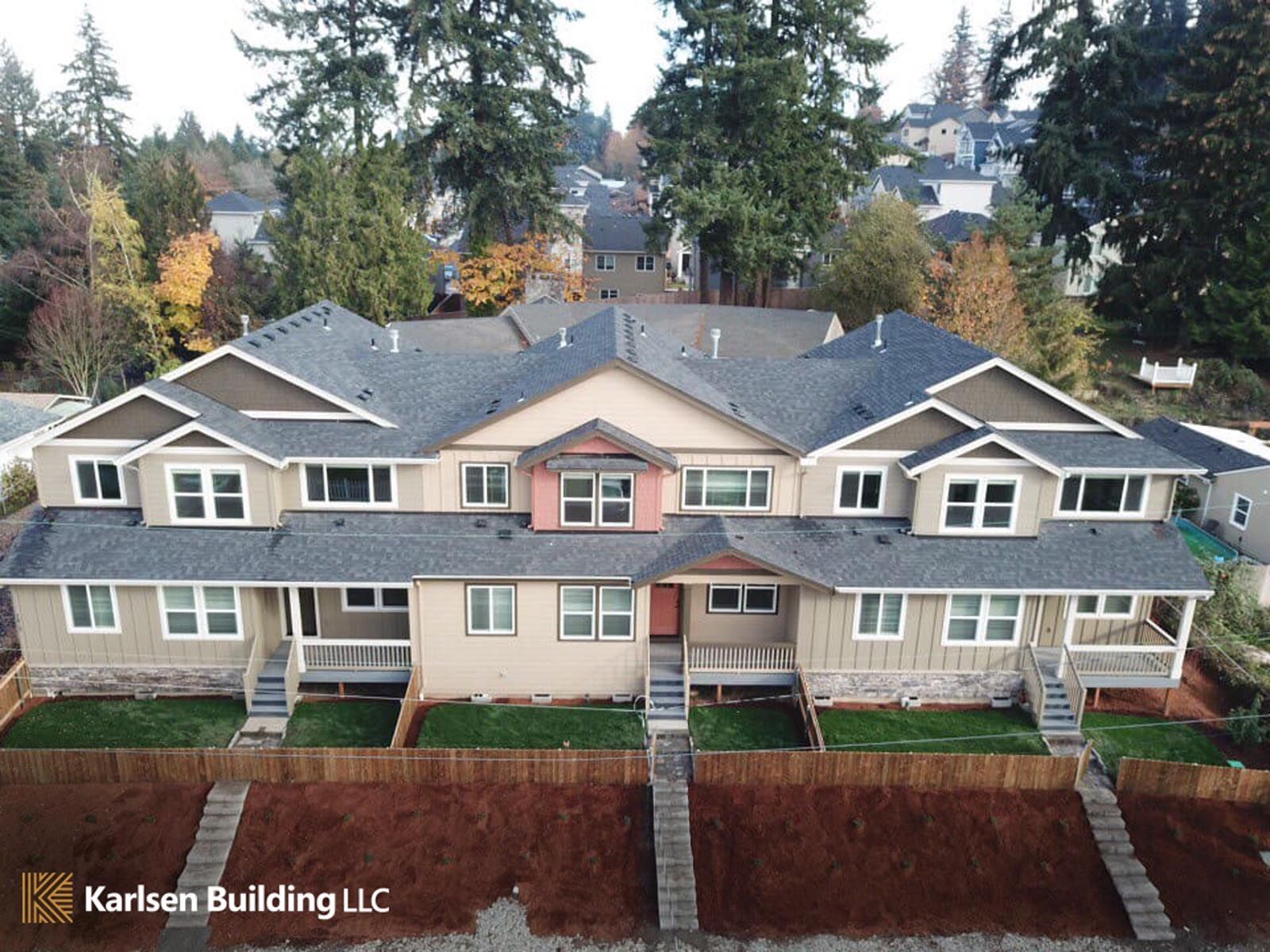 An aerial view of a row of houses by karlson building llc