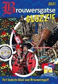 Omslag van een carnavalsuitgave uit 2021 met verklede mensen, carnavalsobjecten en tekst in het Nederlands.