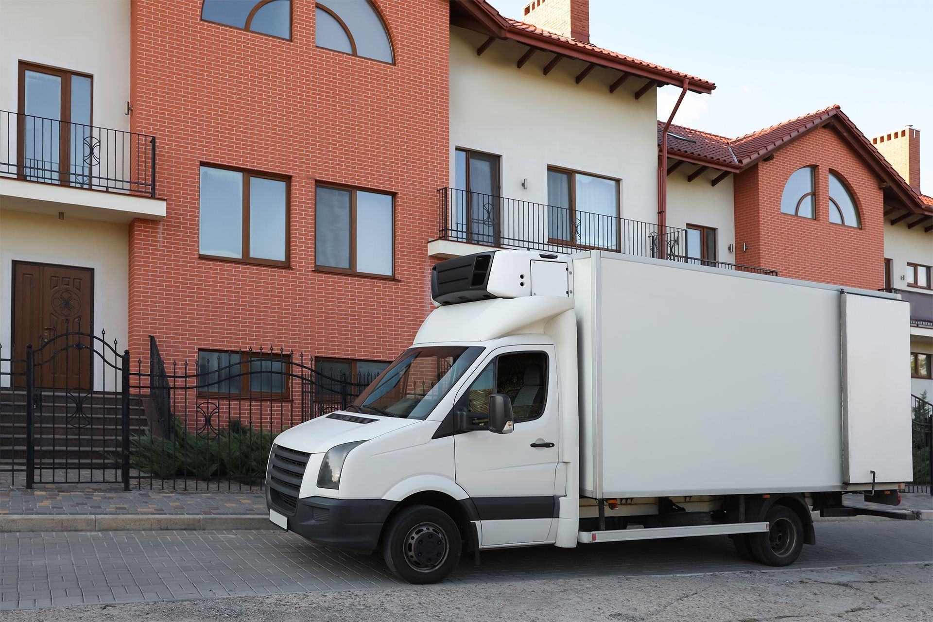 Moving Truck Outside the House