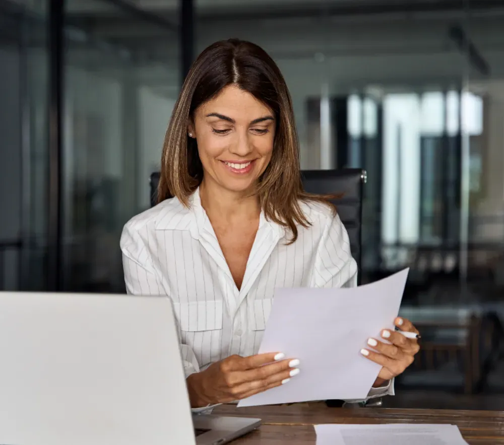 Woman reading tax resources