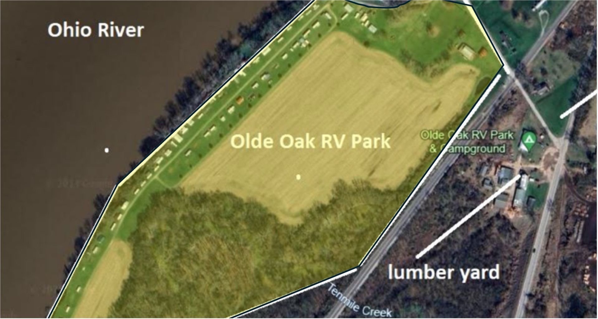 Aerial map of Olde Oak RV Park beside the Ohio River, with a lumber yard nearby.