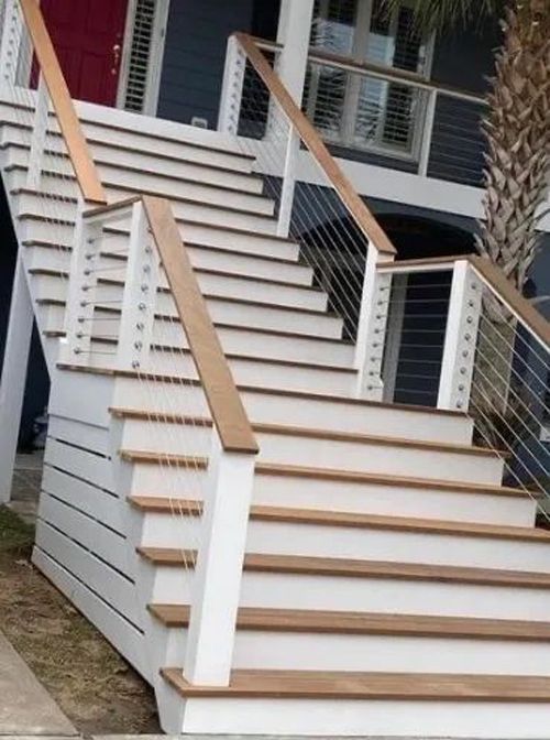 A set of stairs leading up to a house