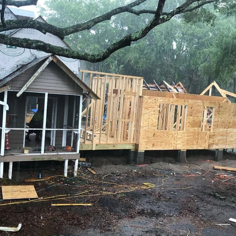 A house that is being built with a porch