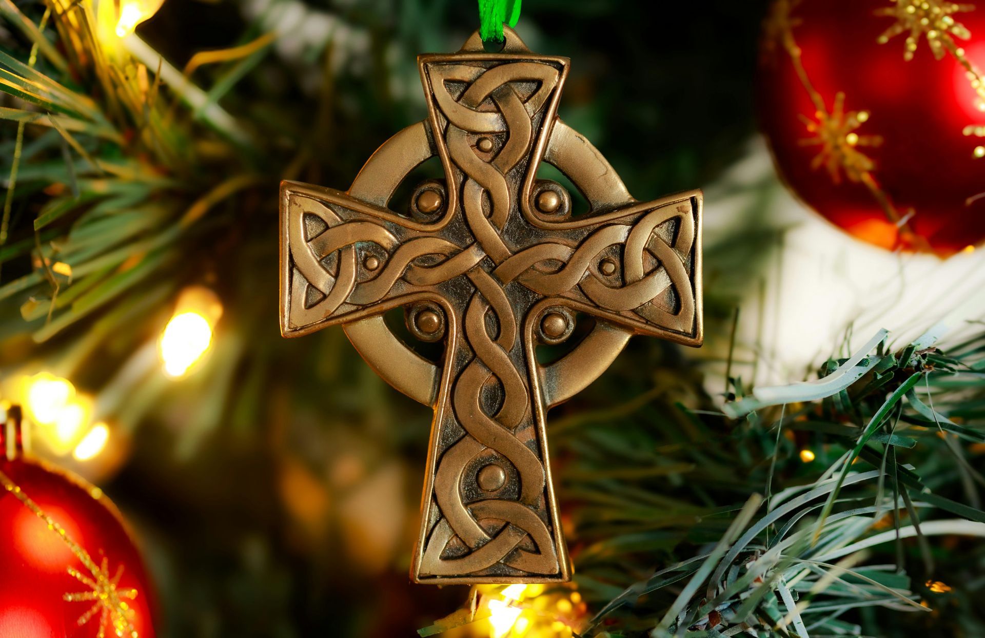 Celtic cross ornament on Christmas tree.