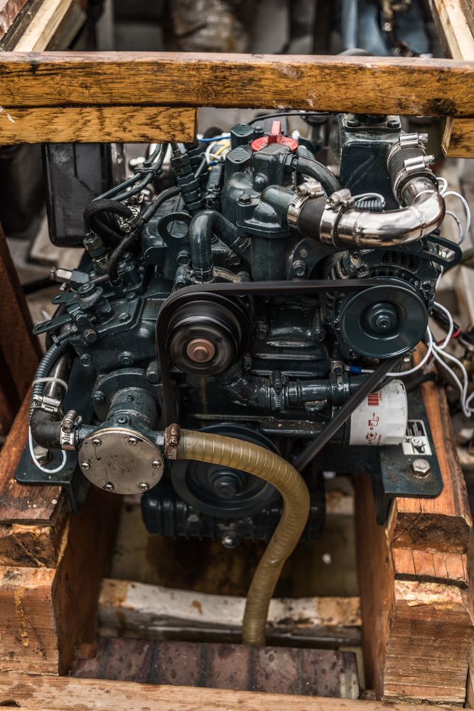 Dark Blue Engine Mounted on a Wooden Frame — Enterprise Auto Repairs in Buderim, QLD
