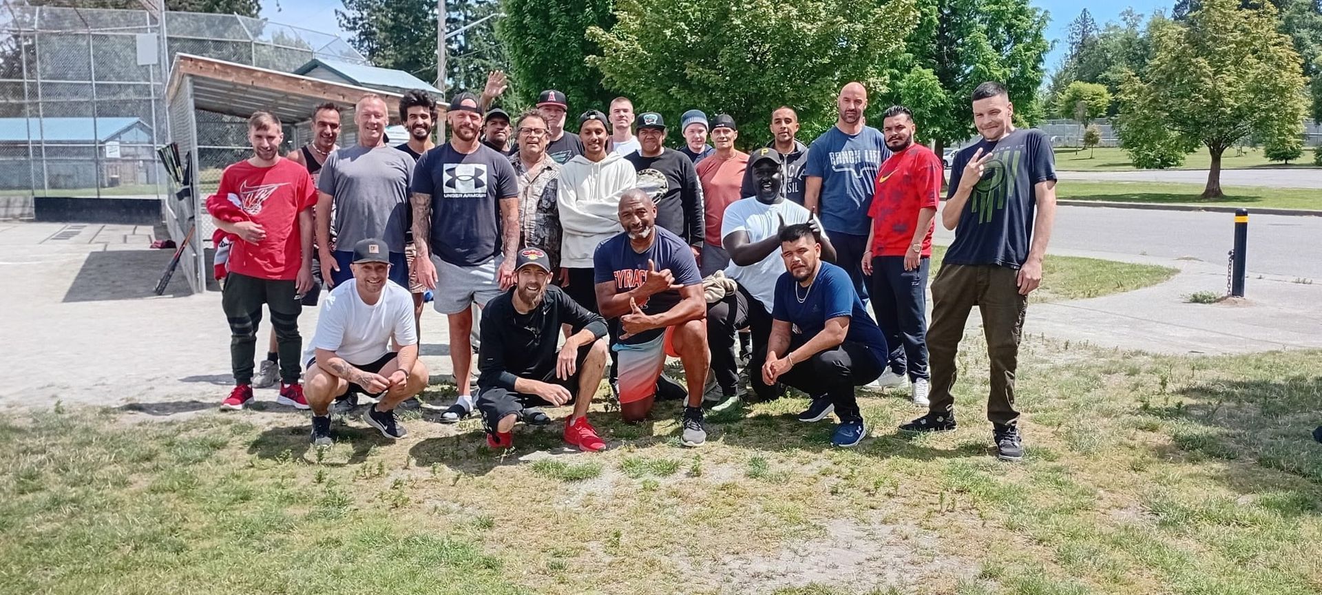 Group photo of men outside