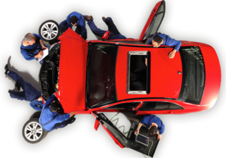 A group of mechanics are working on a red car | Ed's Automotive