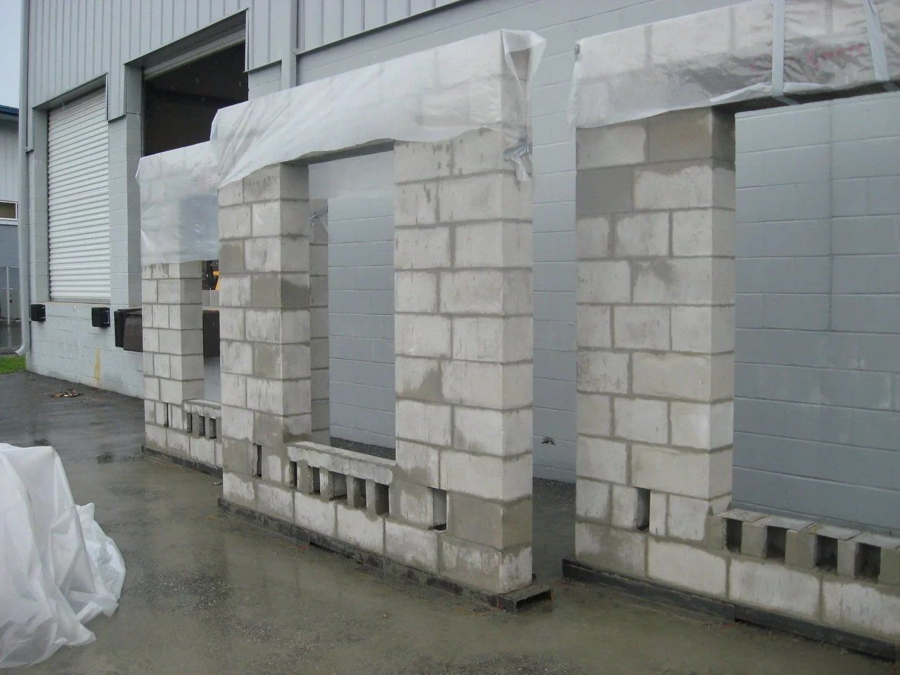 Men Are Painting The Side Of A House | Tampa, FL | Mr. Patio