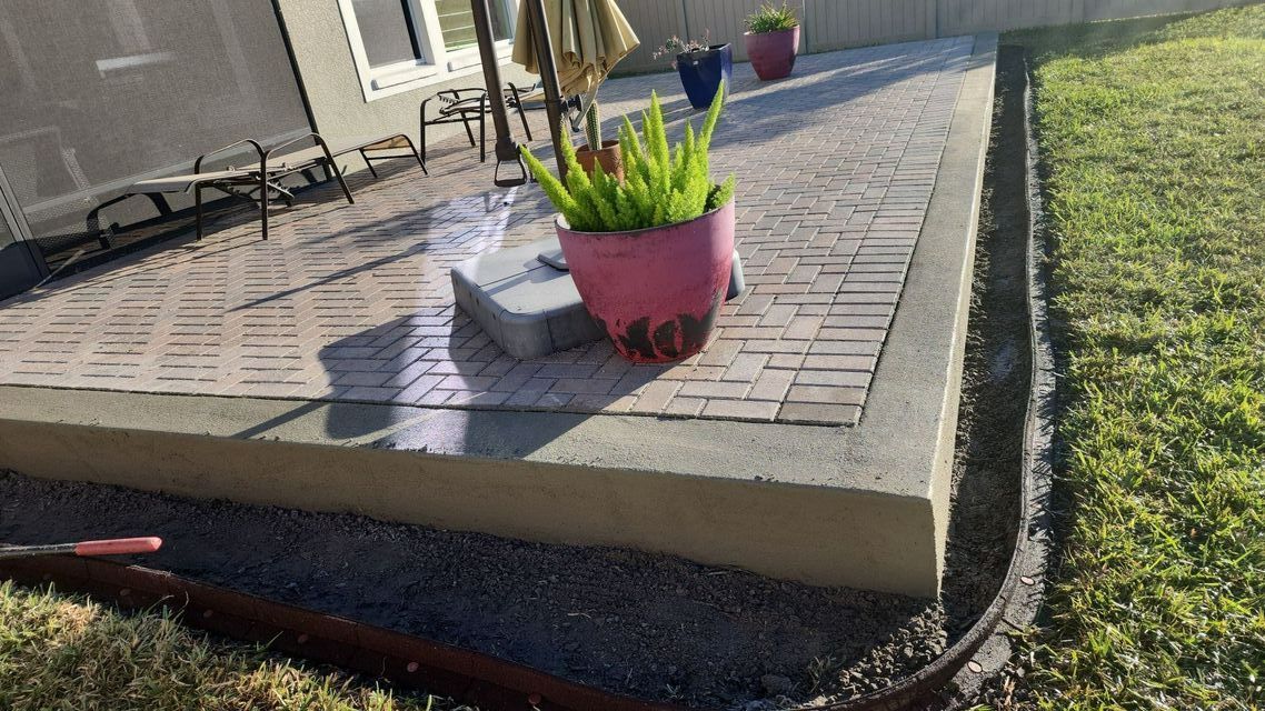 Pink Potted Plant Is Sitting On A Brick | Tampa, FL | Mr. Patio
