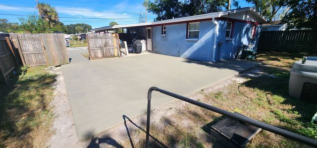 Balcony With A Table And Chairs | Tampa, FL | Mr. Patio