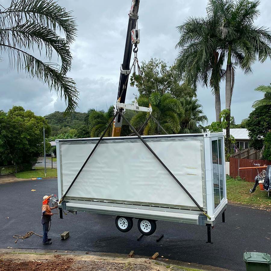 Graceful Crane Lifting a Trailer at Simmons MetalWorks - Professional Mobile Fabrication in Cairns