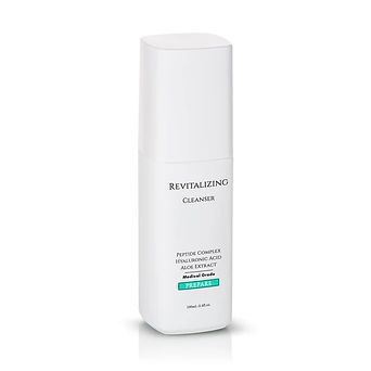 White bottle of Revitalizing Cleanser on a plain background