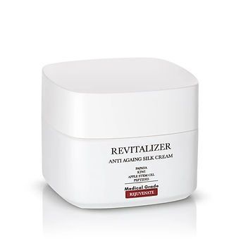 White jar of Revitalizer anti-aging silk cream with a rounded square lid on a white background