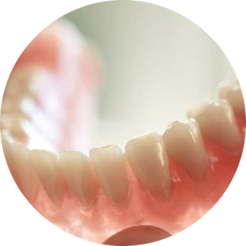 A close up of a person 's teeth in a circle.
