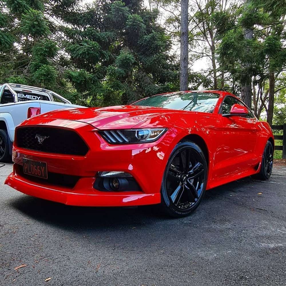 Vibrant Red Mustang Gleaming in Sunlight — Remedy Mobile Car Detailing in Gold Coast, QLD