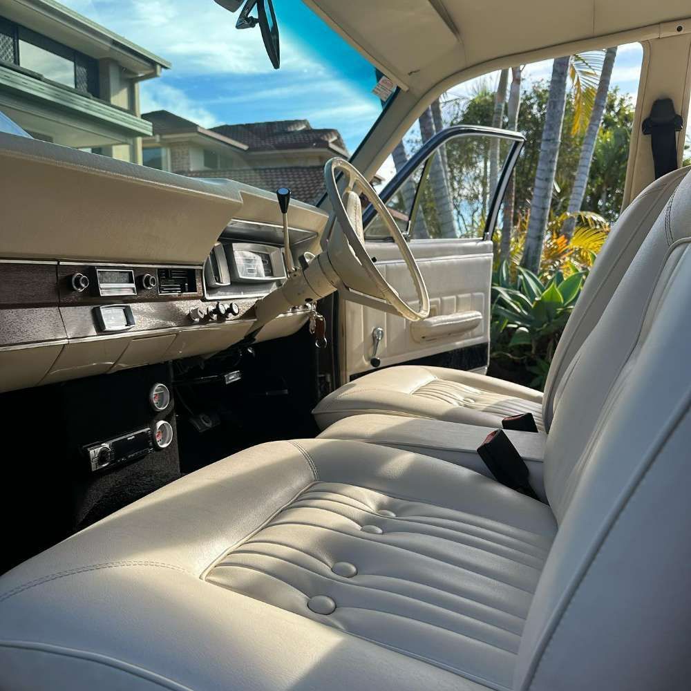 The Inside of a Car With White Seats and a Steering Wheel — Remedy Mobile Car Detailing in Gold Coast, QLD