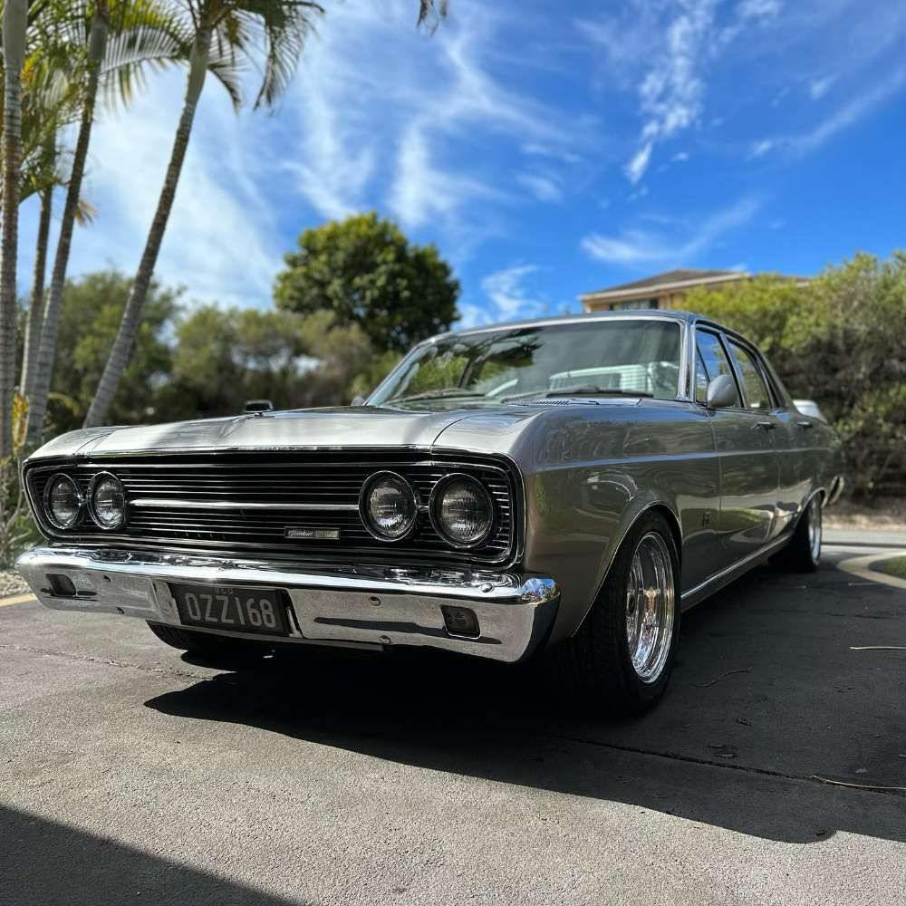 A Silver Vintage Car Parked side View on Open Space — Remedy Mobile Car Detailing in Gold Coast, QLD