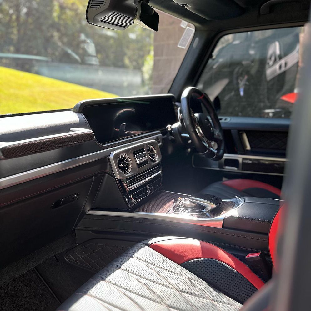 The Inside Of A Car With Red Seats And A Steering Wheel — Remedy Mobile Car Detailing in Mermaid, QLD
