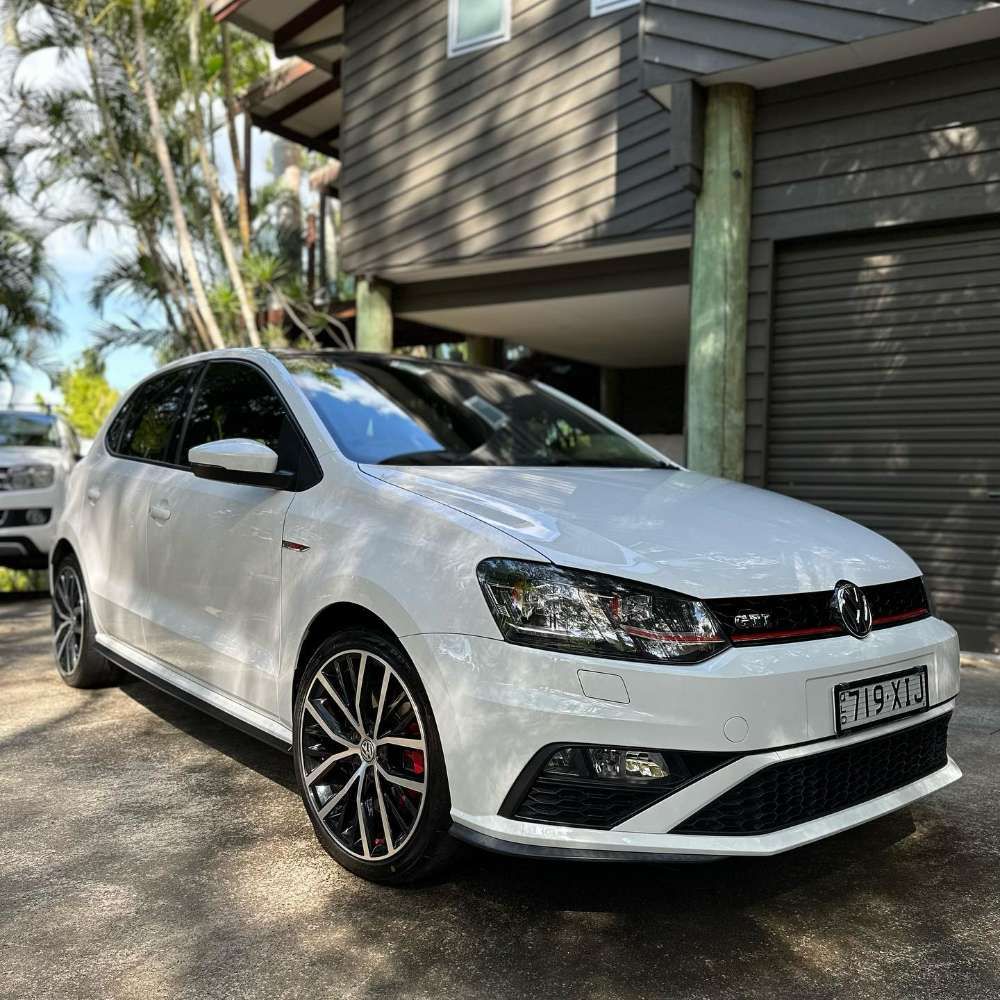 White Volkswagen Polo GTI Parked in Front of a House — Remedy Mobile Car Detailing in Gold Coast, QLD