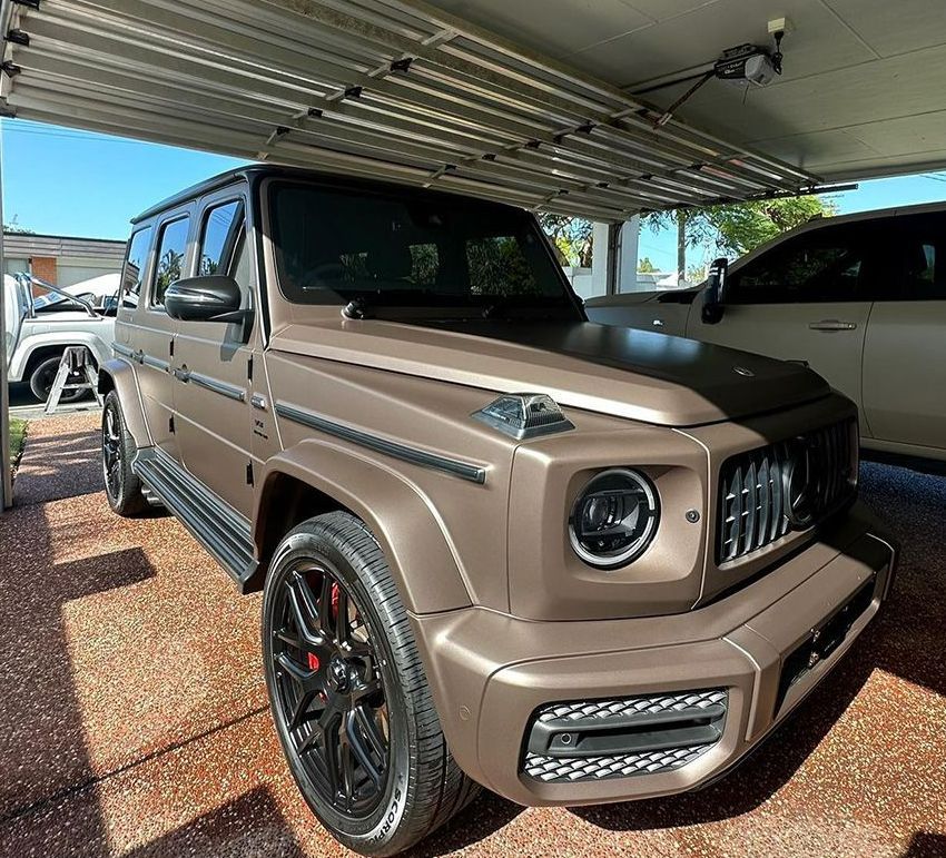A Mercedes Benz G63 Is Parked Under A Garage Door — Remedy Mobile Car Detailing in Burleigh, QLD