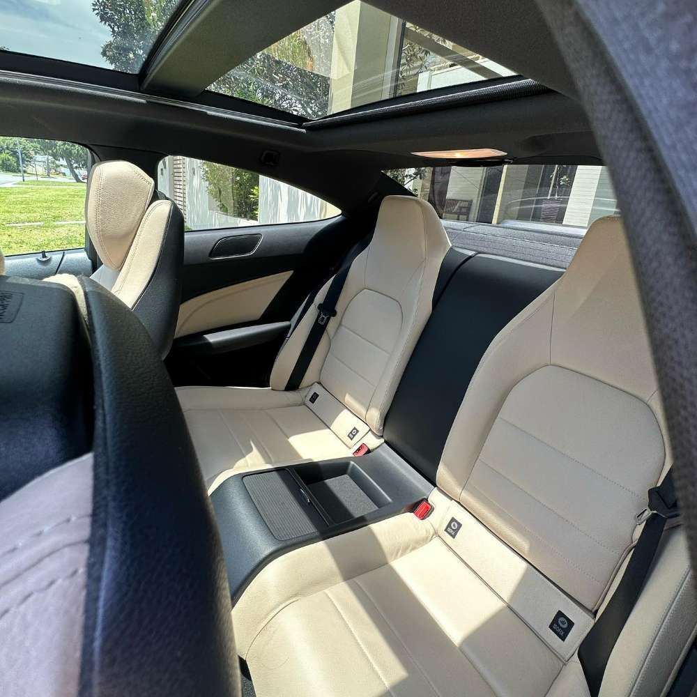 In The Back Seat Of A Car Featuring A Sunroof — Remedy Mobile Car Detailing in Gold Coast, QLD