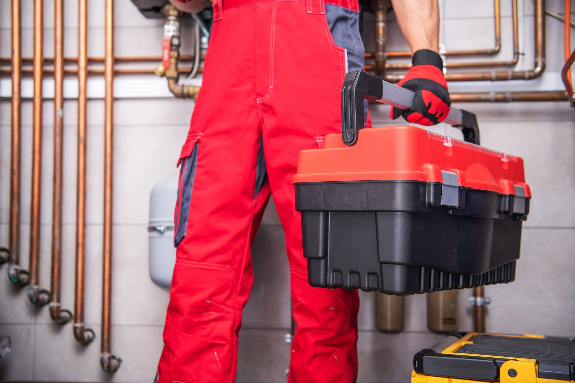 Technician with toolbox showcasing heating repair services professionalism for reliable comfort.