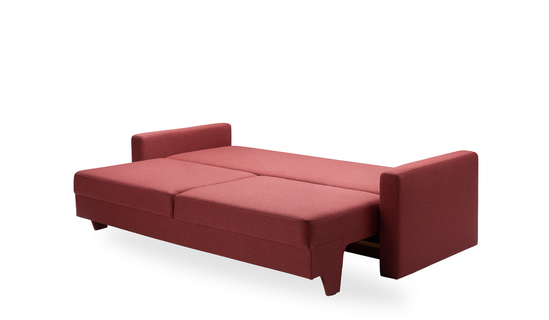 Ein rotes Sofa ist ausgezogen ohne Polster auf weißem Hintergrund