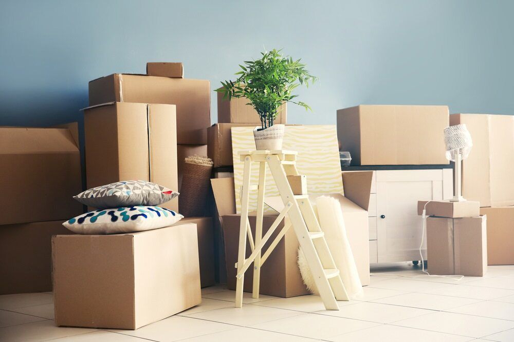 Numerous boxes gathered in a single room