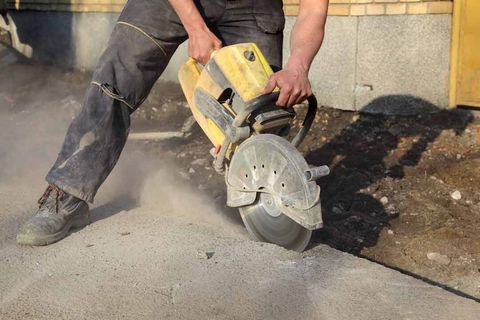 Man grinding — Concrete Grinding in Cairns,QLD