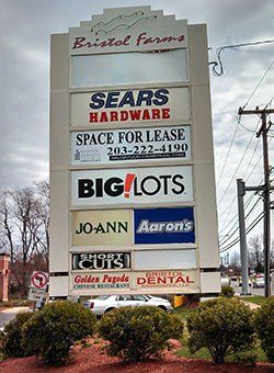a building with sears hardware big lots jo ann and aaron 's on it