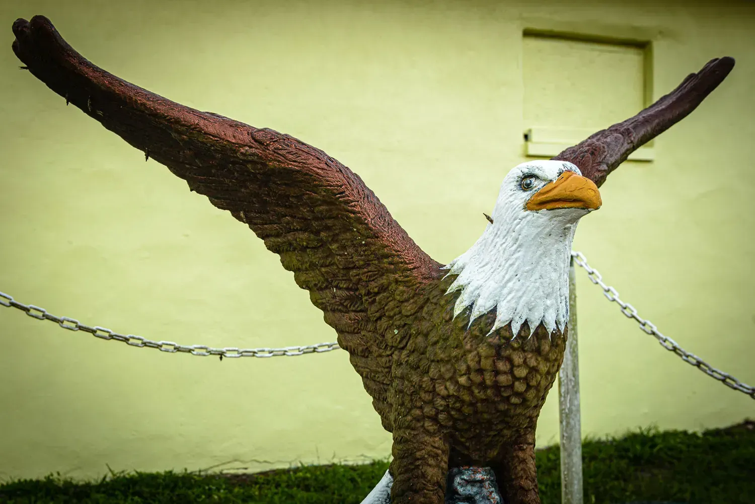 A statue of an eagle with its wings outstretched