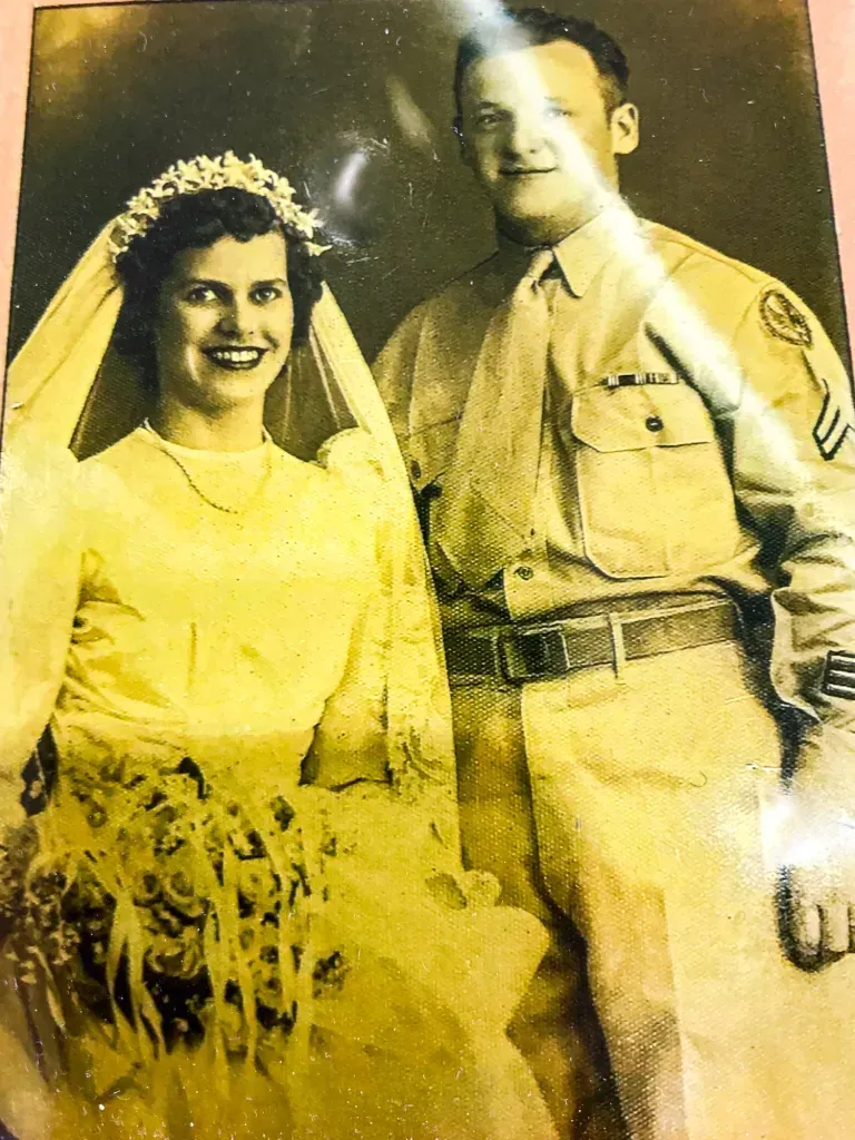 A black and white photo of a bride and groom