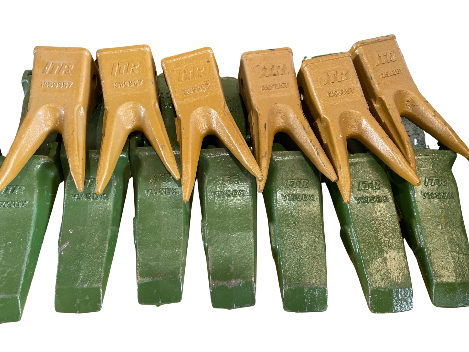 Yellow front-end loader carrying rocks on a white background — Forecast Machinery in Yarrawonga, NT