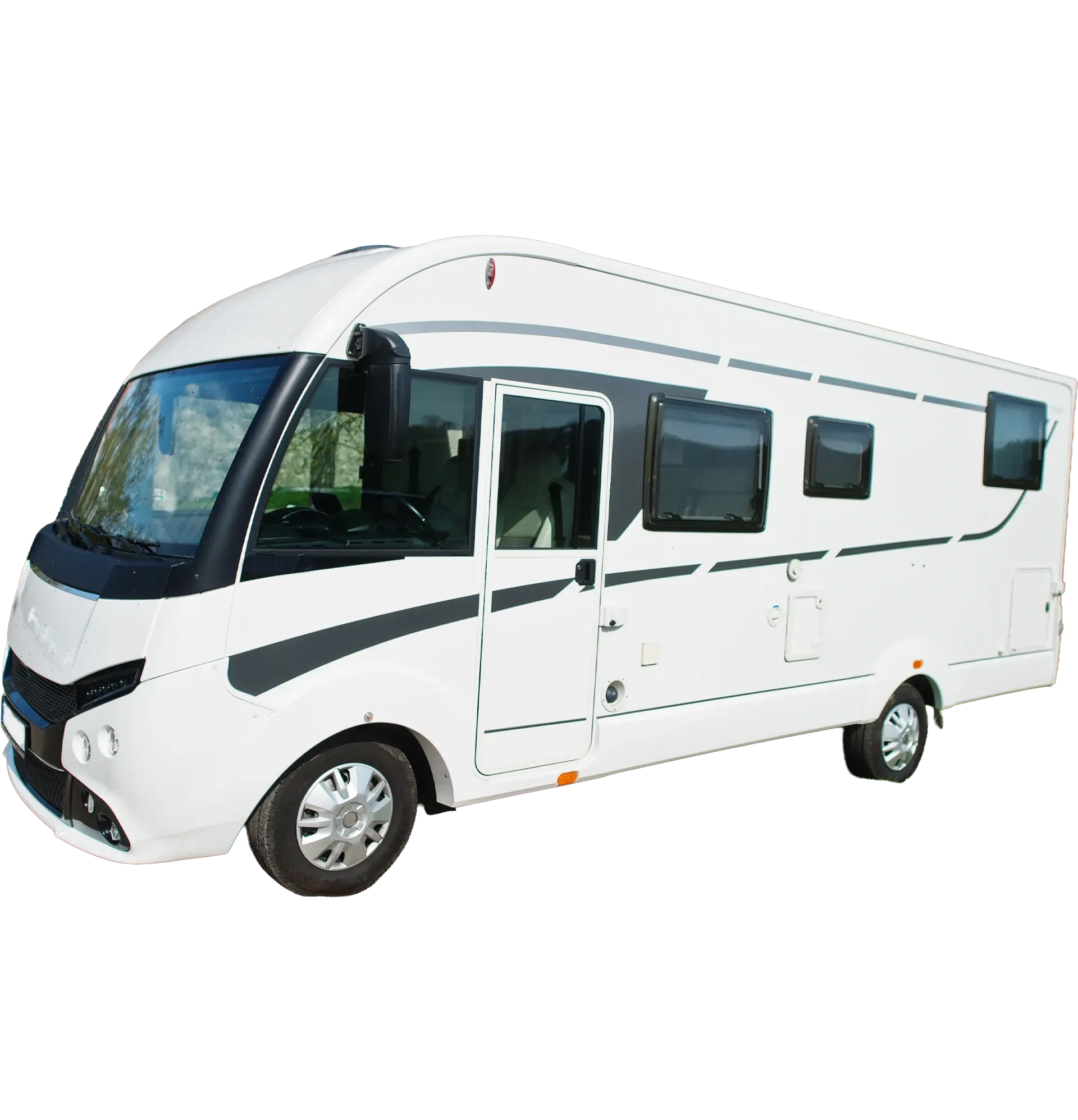 A clean white RV parked outdoors with a technician preparing equipment for professional RV waste pumping service