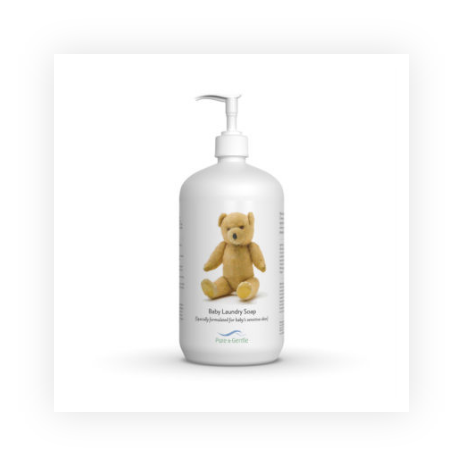 A bottle of baby laundry soap with a teddy bear on it.