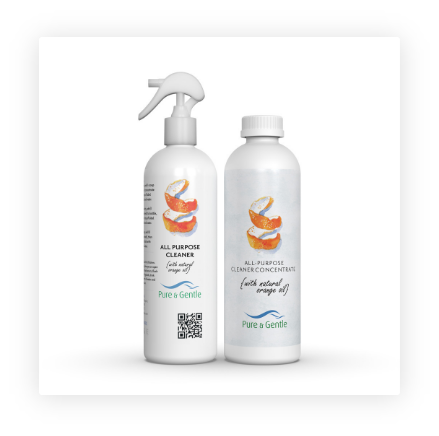 Two bottles of cleaning products are sitting next to each other on a white surface.