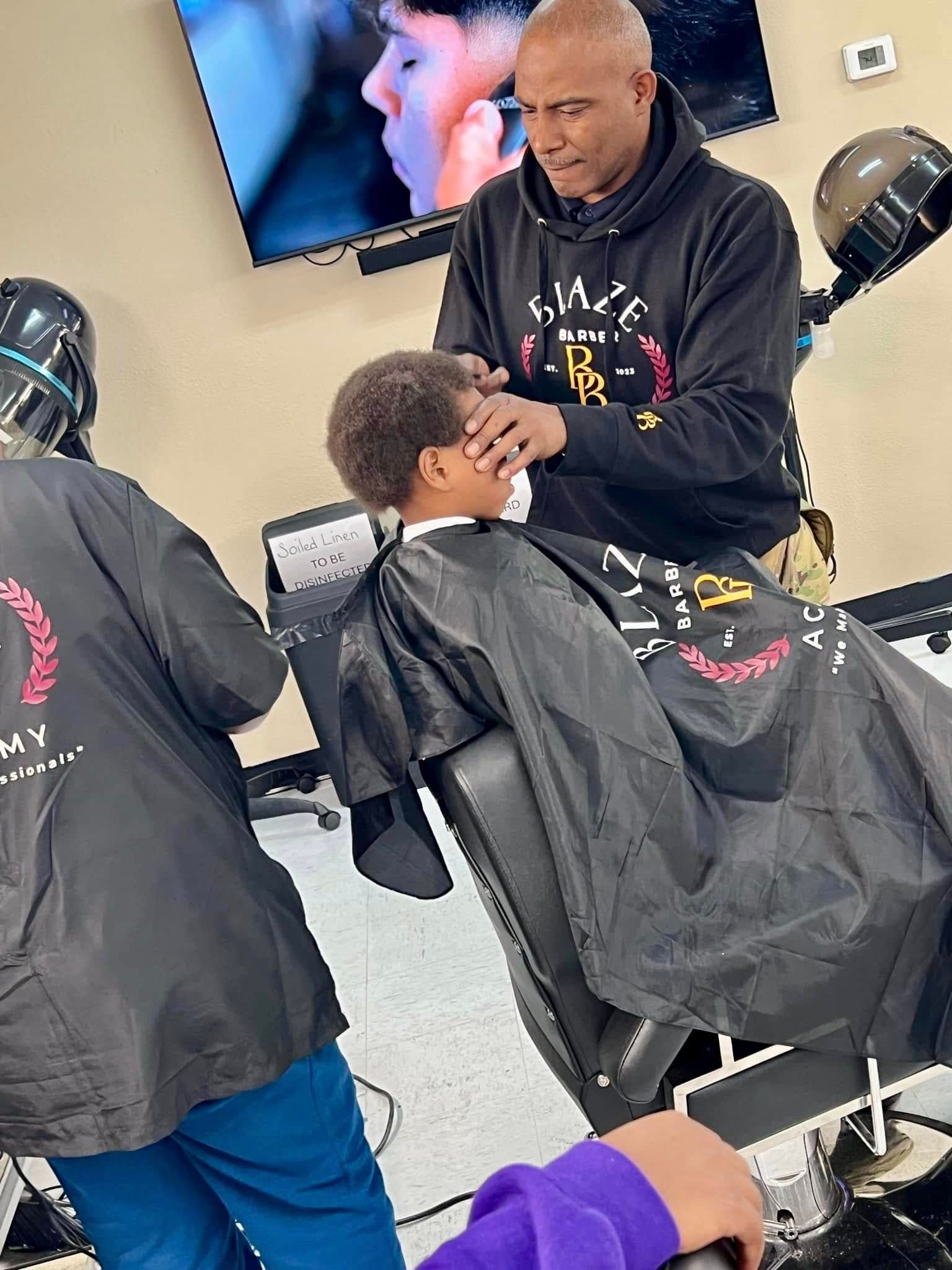 A man having haircut 