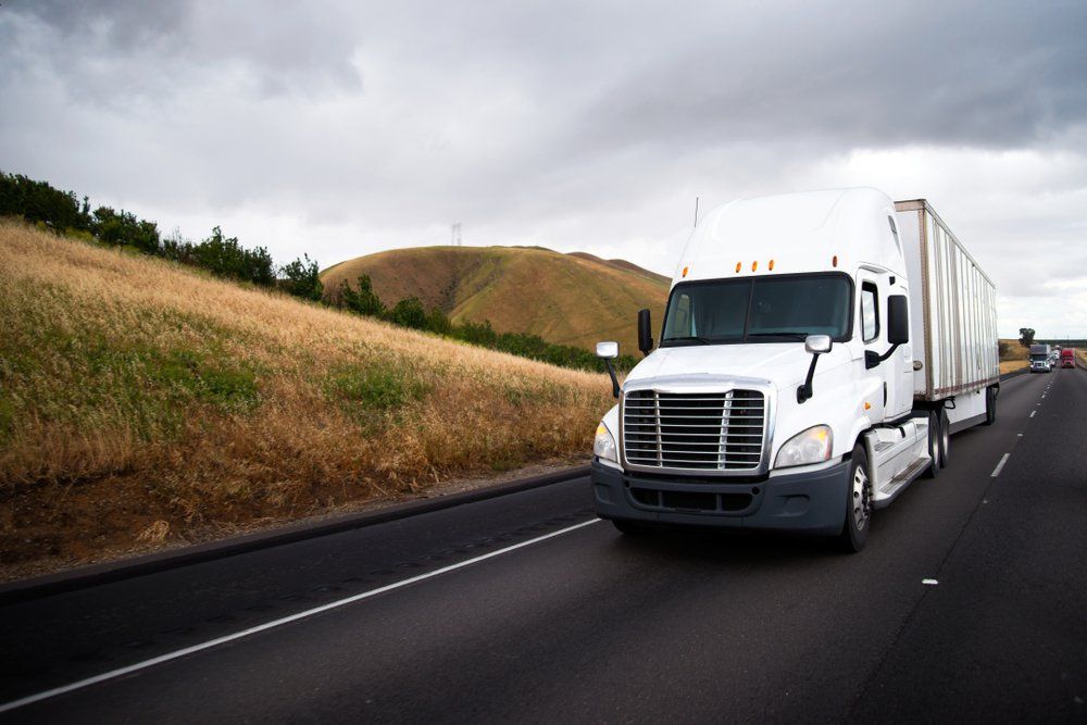 White Big Rig Semi Truck — Logistics In Mount Isa, QLD