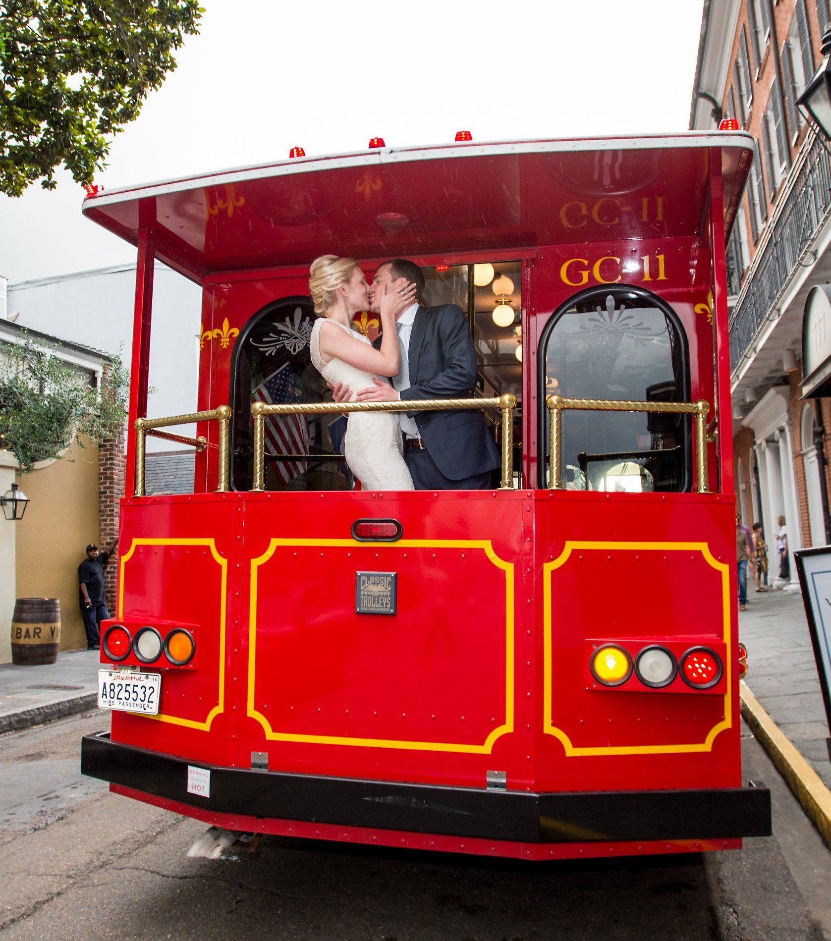 A large room filled with tables and chairs and a chandelier.