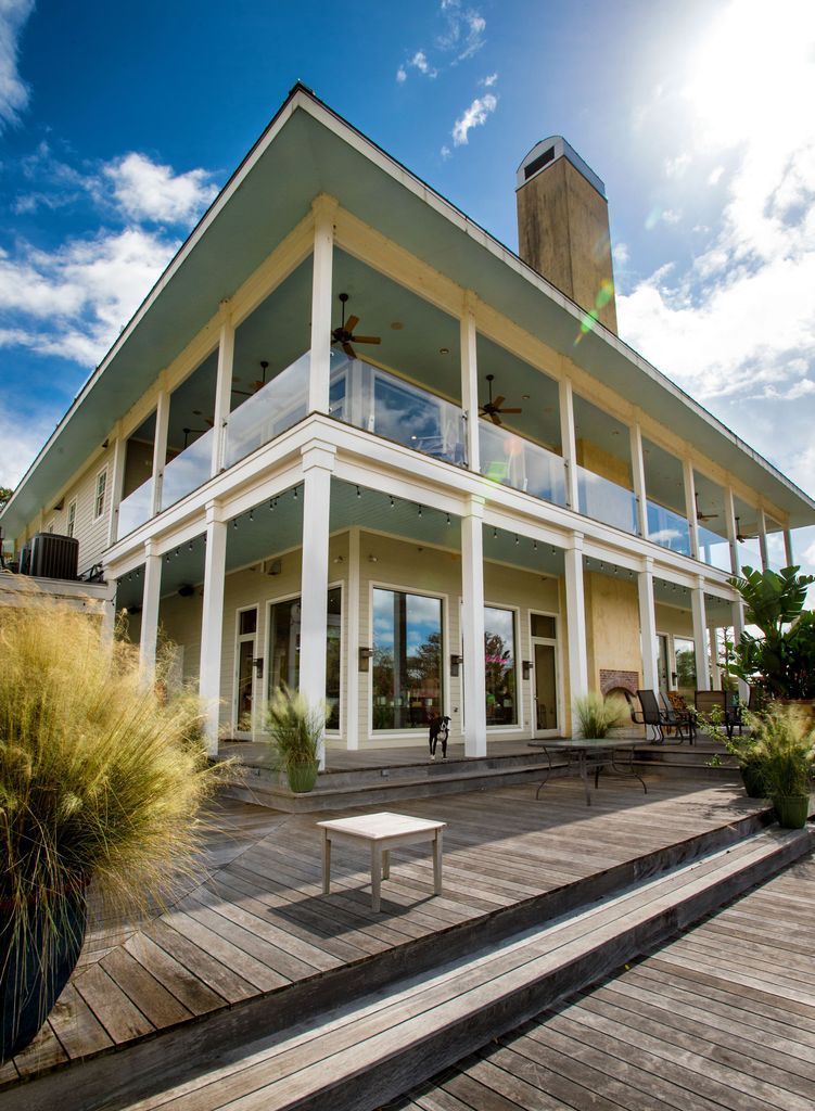 A large house with a lot of windows and balconies