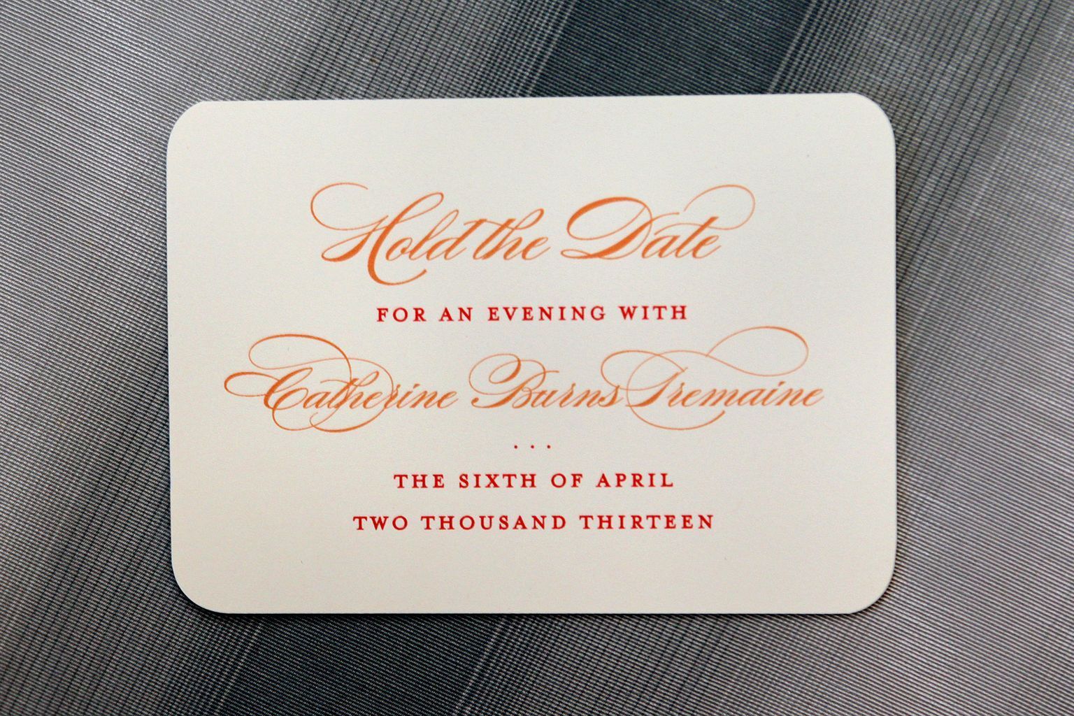 A card that says to hold the date for an evening
